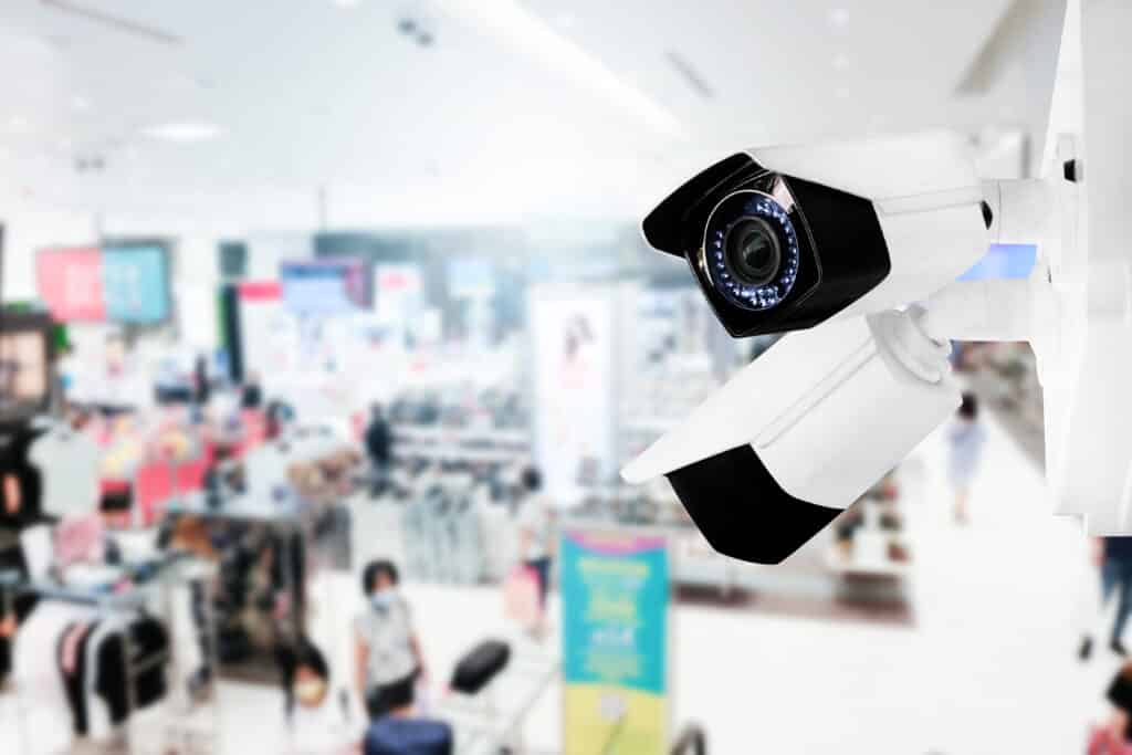 modern public cctv camera with blur interior shopping mall background copy space 1